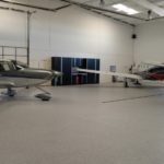 Global Garage Flooring & Cabinets | Red 9 Hangar